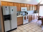 The kitchen is fully-equipped with a Refrigerator, Blender, Coffee Maker, Electric Oven and Range, Microwave, Toaster, Cookware and Dishwasher